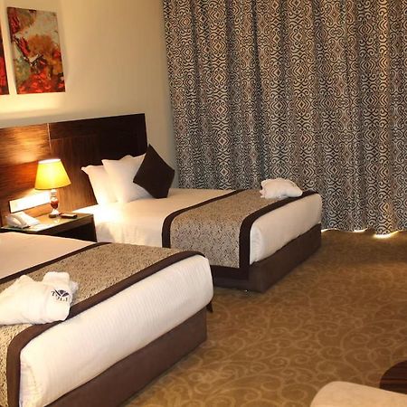 โทลิป อัลฟอร์ซาน ไอส์แลนด์ โฮเต็ล แอนด์ สปา Hotel อิสไมเลีย ภายนอก รูปภาพ A room at the hotel