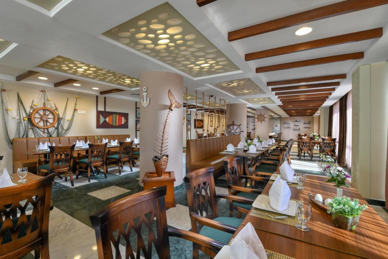 โทลิป อัลฟอร์ซาน ไอส์แลนด์ โฮเต็ล แอนด์ สปา Hotel อิสไมเลีย ภายนอก รูปภาพ The restaurant