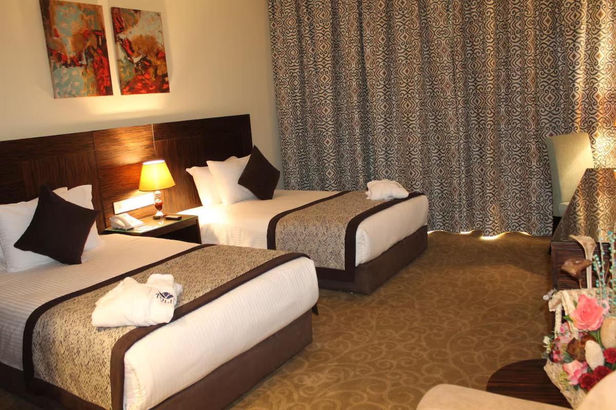 โทลิป อัลฟอร์ซาน ไอส์แลนด์ โฮเต็ล แอนด์ สปา Hotel อิสไมเลีย ภายนอก รูปภาพ A room at the hotel